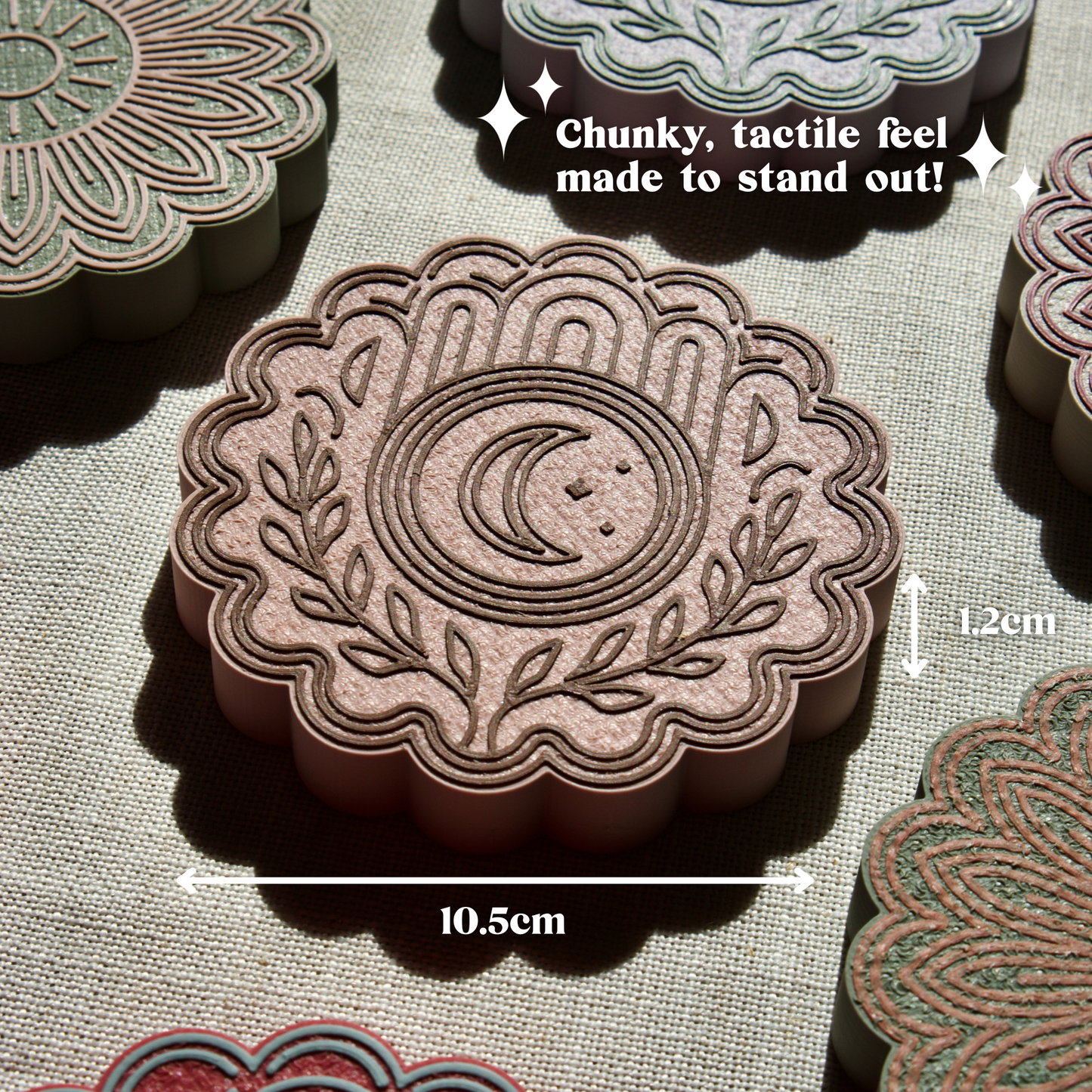Close up shot of our Rosevine coaster in pink and brown, featuring a moon design perfect for witchy decor.