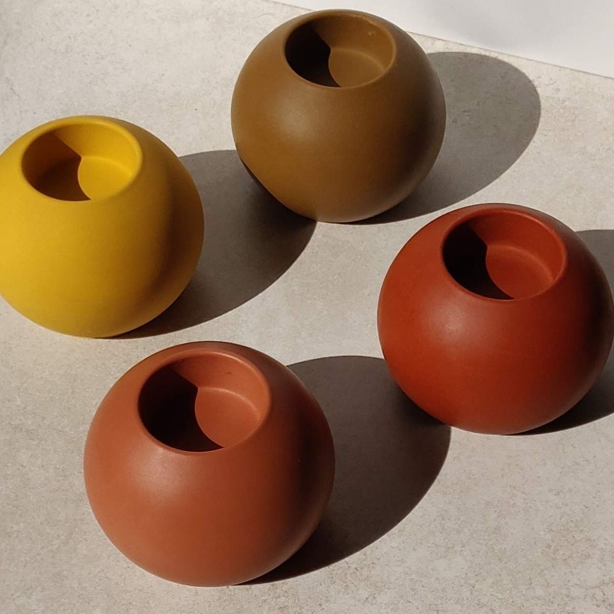 set of 4 tea light holders for candles made in the UK by Moonkind Studios