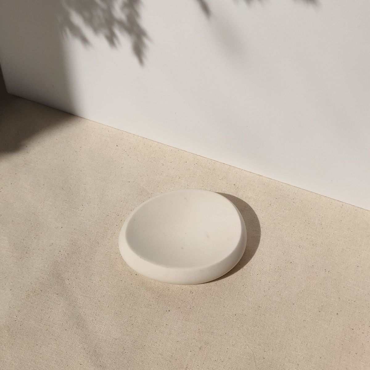 white jewellery dish made in the UK by Moonkind Studios, perfect for dainty earrings, rings and necklaces